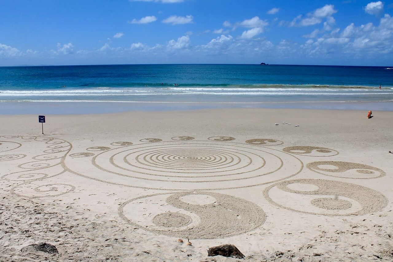 blocco creativo spiaggia simboli yin yang